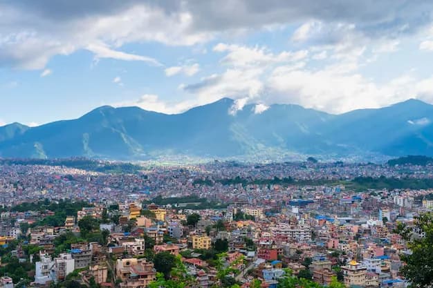 Kathmandu city spread out below the surrounding hills